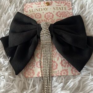 Sunday State Hair Clip With Black Polyester Bow Dripping Rhinestone Detail